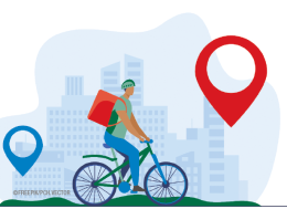 rider on a bike with city behind